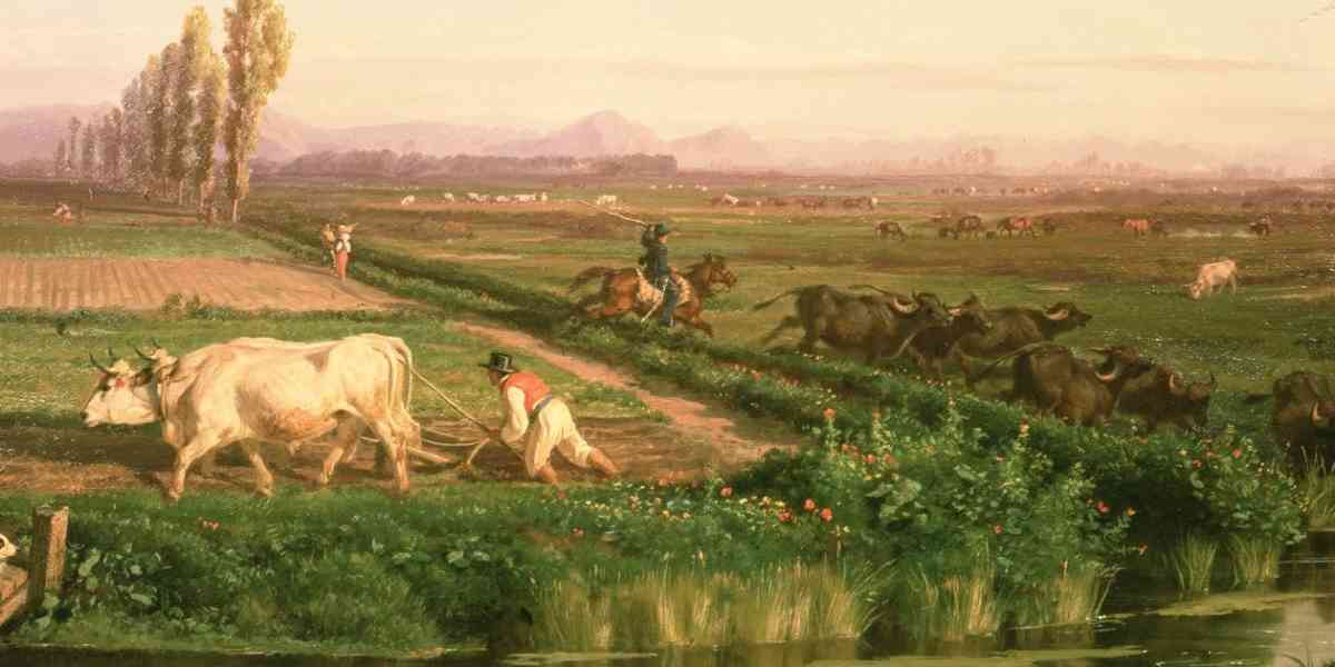 A pastoral scene in which a pair of oxen are pulling a plow and a herd of cattle are being rounded up